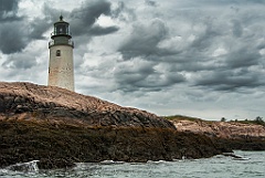 Storm Clouds Disperse by Moose Peak Light at Low Tide